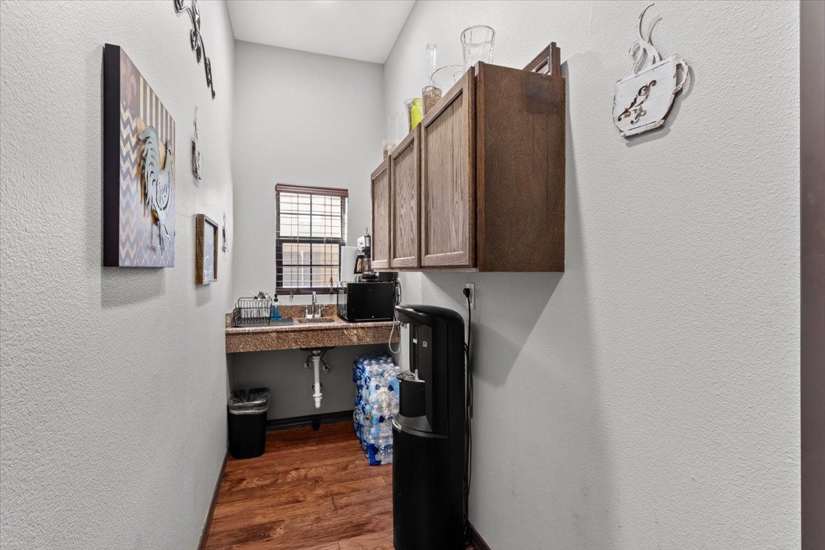 Coffee bar with sink and cabinets