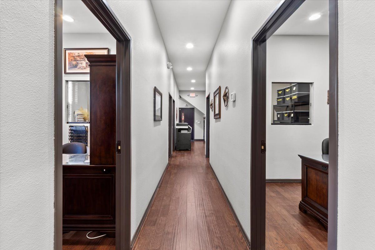 Central hallway lined with offices