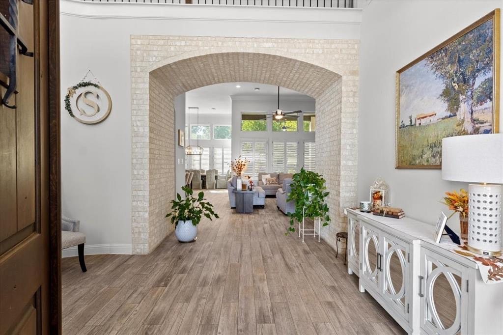 Front entry looking through a brick archway
