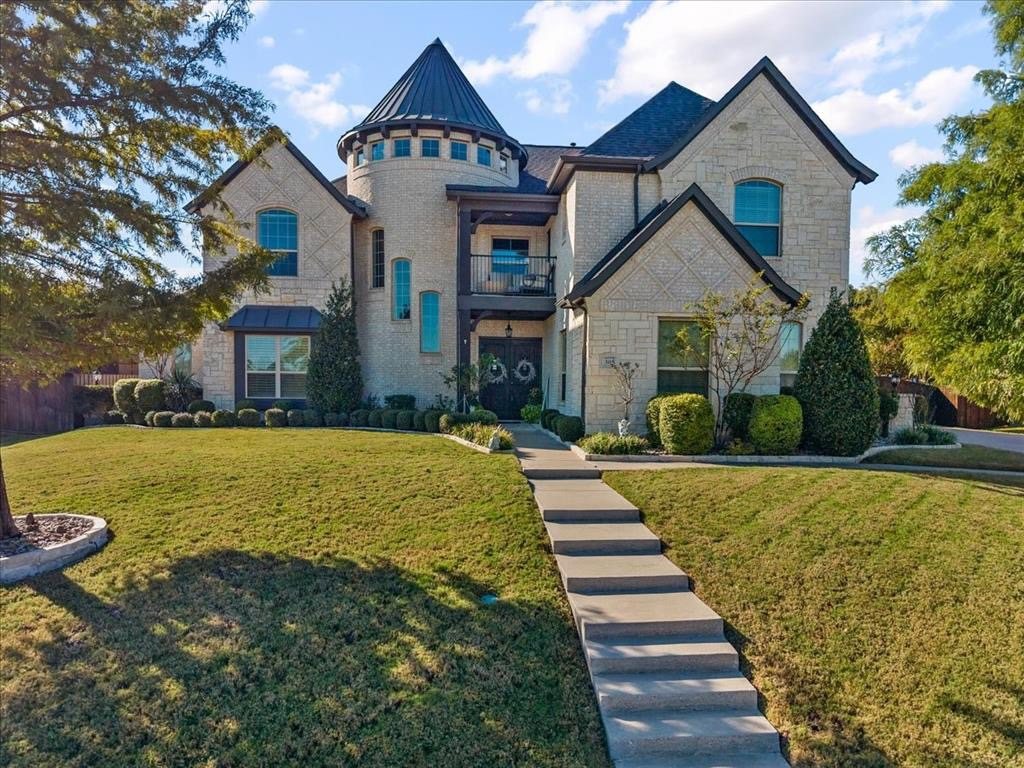 Front of 305 Landview Drive with its stone turret and long front walk
