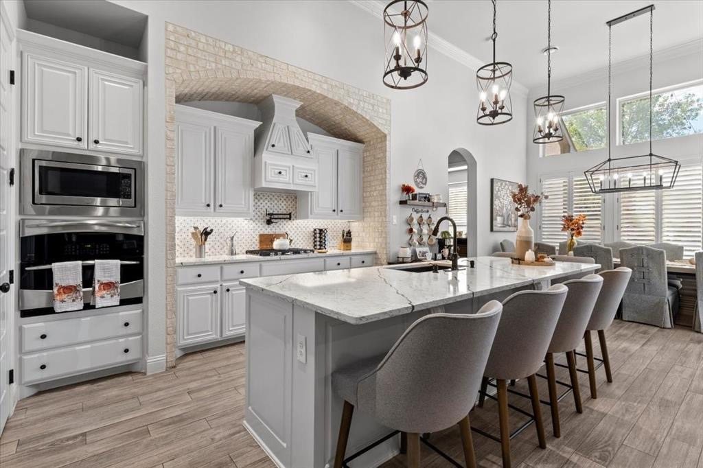 Kitchen with double ovens and island