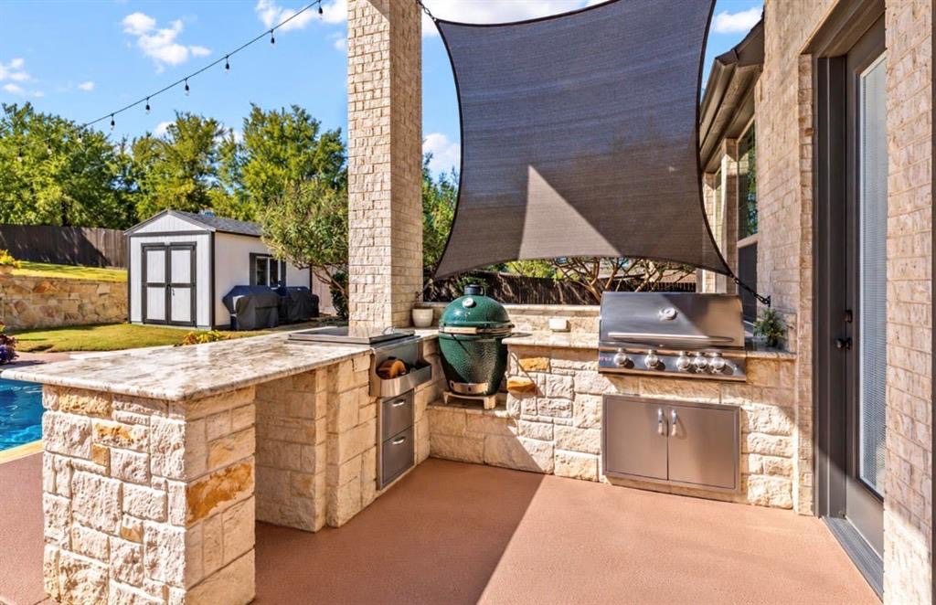 Outdoor kitchen with built-in gas grill