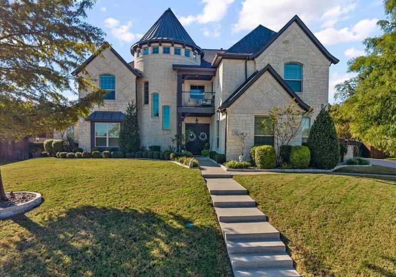 305 Landview Drive in Burleson, a stone home with a turret